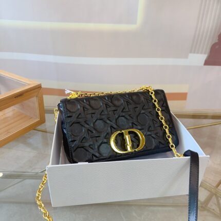 The handbag is carefully crafted from cowhide leather, with signature wicker stitch detailing for stitching